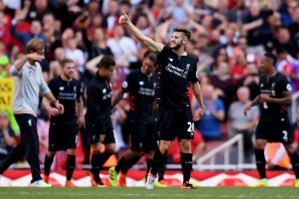 Adam Lallana merai kemenangan 4-3 Liverpool ke atas Arsenal pada Ahad (14 Ogos). 