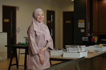 Cik Farahliza Zainal, ibu anak remaja yang menghidap autisme dan pengasas sebuah perusahaan sosial, yang menjadi sukarelawan program CareConnect. 