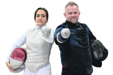 Amita Berthier (kiri) telah kembali dari Amerika Syarikat ke Singapura untuk berlatih dengan ketua jurulatih acara foil nasional, Oleg Matseichuk.