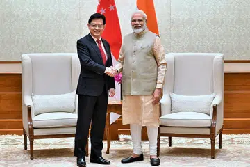 PERTEMUAN PEMIMPIN: Timbalan Perdana Menteri, Encik Heng Swee Keat (kiri) mengesahkan hubungan kukuh antara Singapura dengan India semasa menemui Perdana Menteri India, Encik Narendra Modi, di New Delhi pagi semalam. - Foto KEMENTERIAN PENERANGAN & PENYIARAN, INDIA