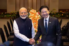 Perdana Menteri India, Encik Narendra Modi (kiri), bertemu dengan Perdana Menteri Singapura, Encik Lawrence Wong (kanan), di Bangunan Parlimen pada 5 September.