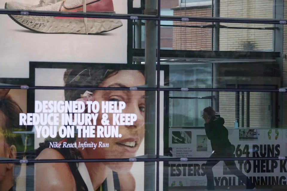 DIDAKWA TIDAK BAYAR GAJI PEKERJA: Nike  digesa bayar gaji para pekerja kilang pakaian di Kemboja dan Thailand, yang kehilangan gaji selepas penutupan kilang. 