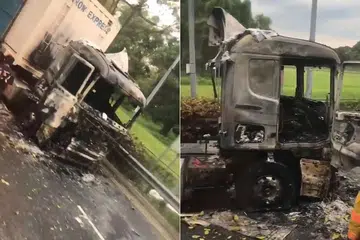 Video yang dikirimkan pembaca The Straits Times menunjukkan lori yang terbakar di lorong paling kiri. - Foto tangkap layar video SHANNON TAN