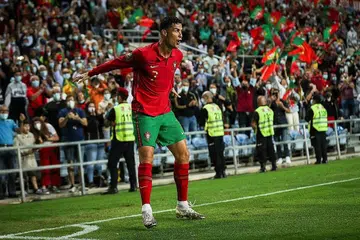 SENTUHAN HEBAT: Bintang Portugal, Cristiano Ronaldo, meraikan golnya semasa kemenangan besar 5-0 ke atas Luxembourg. - Foto AFP