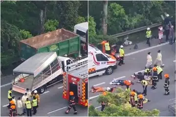 KEMALANGAN LIBATKAN PEKERJA ASING: Video kesan kemalangan di PIE yang dimuatnaikkan ke Facebook menunjukkan beberapa lelaki terbaring bergelimpangan di jalanan. - Foto TANGKAP LAYAR FACEBOOK