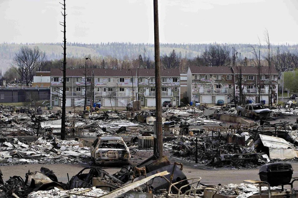 MUSNAH AKIBAT KEBAKARAN HUTAN: Kawasan kejiranan Abasand di Fort McMurray, Alberta, Canada, musnah akibat kebakaran. - Foto REUTERS