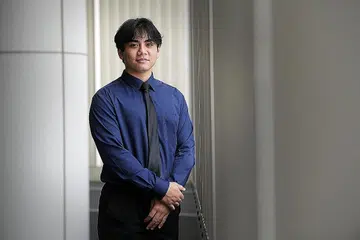 MUHAMMAD ANAQI: Akan menyertai syarikat LS 2 Services Pte Ltd, dan akan mempelajari asas industri pembersihan, tren dan juga teknologi yang sedang dibangunkan dalam industri ini. - Foto BH oleh ALPHONSUS CHERN