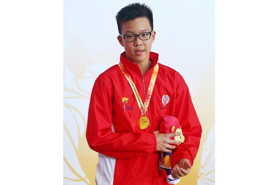 PERENANG MASA DEPAN SINGAPURA: Baru berusia 15 tahun, Mikkel Lee membuktikan potensinya yang besar apabila merangkul empat pingat emas dan sebutir perak di ASG kali ini. - Foto-foto THE STRAITS TIMES