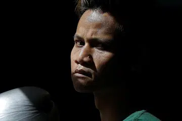 MAHUKAN KECEMERLANGAN: Muhamad Ridhwan akan sasar mengangkat kejuaraan kelas 'super feather' Majlis Tinju Dunia (WBC) di Kejohanan Diamond Asia WBC yang akan berlangsung di Singapura pada Mac ini. - Foto BH oleh JOEL CHAN