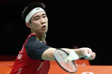 Pemain Singapura, Loh Kean Yew, beraksi semasa perlawanan suku akhir perseorangan lelaki badminton Sukan Asia Aichi-Nagoya 2026 menentang pemain nombor satu dunia dari Indonesia, Jonatan Christie, pada 27 September.