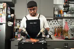Encik Mohamed Nabeel Firdaus Aziz kini turut menawarkan khidmat cef peribadi di bawah perniagaan Chef Naughty Rabbit di dapur rumahnya di Tampines. 