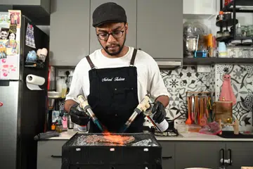 Encik Mohamed Nabeel Firdaus Aziz kini turut menawarkan khidmat cef peribadi di bawah perniagaan Chef Naughty Rabbit di dapur rumahnya di Tampines. 