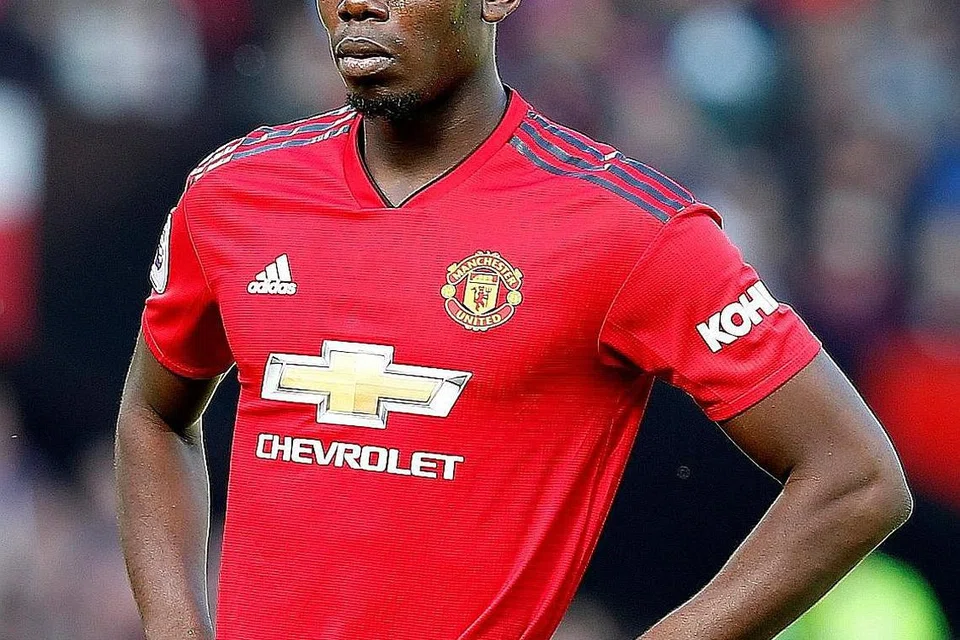 SERTAI PRAMUSIM: Pogba telah disenaraikan dalam skuad Manchester United untuk jelajah pramusimnya meskipun bintang bola sepak Perancis berkenaan menunjukkan hasrat untuk meninggalkan kelab Liga Perdana England itu. - Foto REUTERS