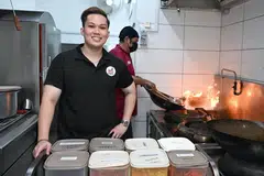 Dahulu seorang pramugara selama sekitar lima tahun, Encik Hadi Hazman (depan) kini menguruskan perniagaan katering keluarganya, Pondok Selera Catering Services, yang ditubuhkan pada 2023.
