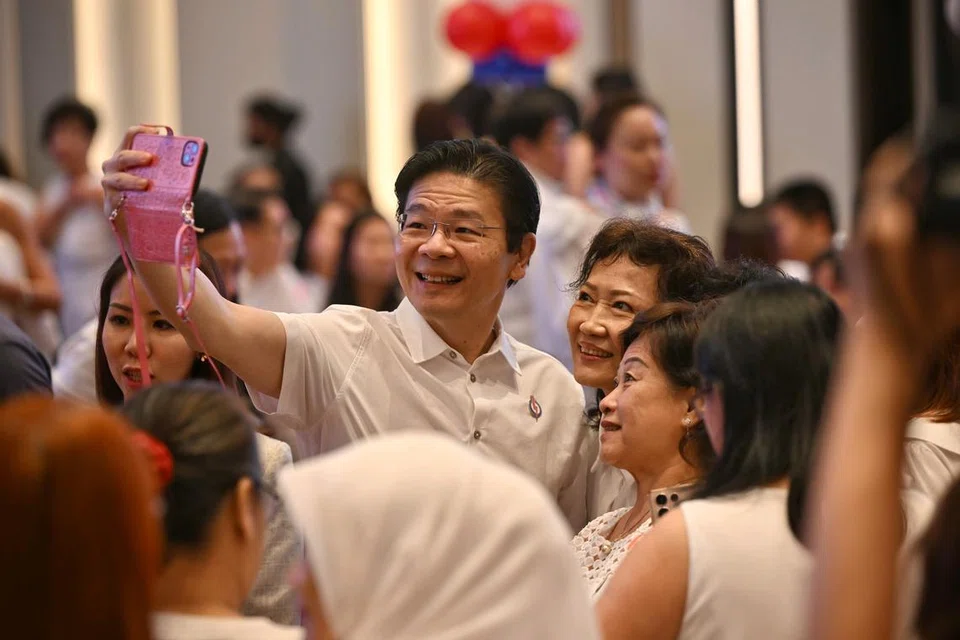 Perdana Menteri, Encik Lawrence Wong, bergambar bersama tetamu di Persidangan Sayap Wanita PAP sempena ulang tahun ke-35 cabang itu pada 31 Ogos di Hotel Grand Copthorne Waterfront.