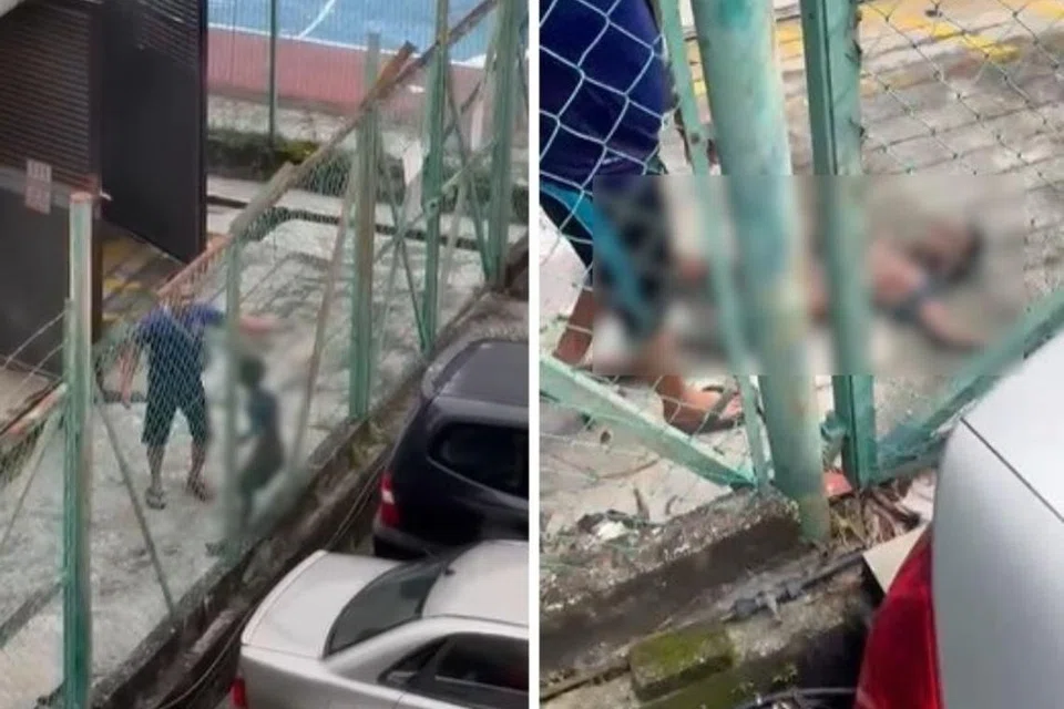 PARAH: Seorang remaja lelaki, kelihatan beliau keluar daripada sebuah bilik jana kuasa elektrik di Pulau Pinang.