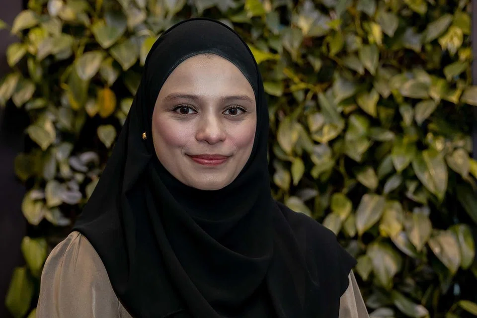 Cik Nur Syifaa’ Hussin, 36 tahun, guru Bahasa Melayu di Sekolah Menengah Ngee Ann, dicalonkan bagi Anugerah Guru Arif Budiman (Agab) 2024 bagi Kategori Perangsang.