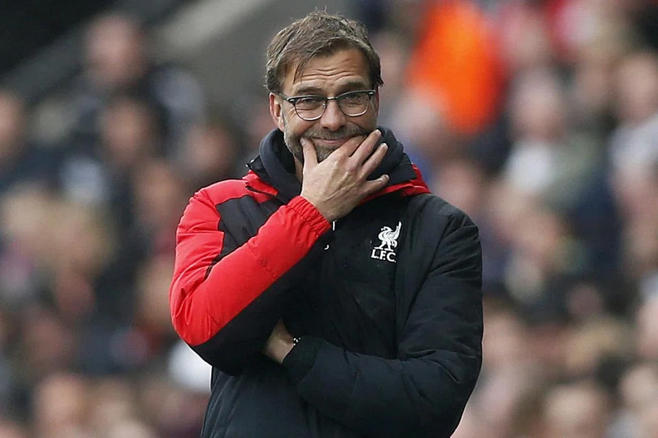 YAKIN BANGKIT: Klopp yakin pasukannya akan bangkit dalam separuh akhir kedua Liga Juara-Juara esok. - Foto REUTERS