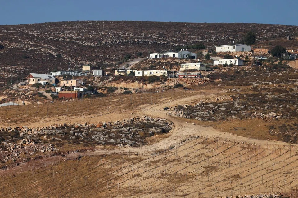 Pemandangan pada 19 Julai menunjukkan beberapa bangunan sedang didirikan serta tapak peluasan yang dirancang di penempatan Israel di Elon Moreh, sebuah perkampungan Palestin di Deir al-Hatab, timur bandar Nablus di Tebing Barat.