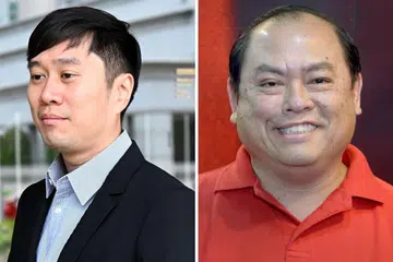 DIDENDA: Jolovan Wham (kiri) dan John Tan masing-masing didenda $5,000 kerana hina badan kehakiman. - Foto AFP, fail