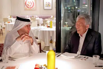 Menteri Kanan, Encik Teo Chee Hean (kanan), bersama Penasihat Perdana Menteri Qatar, Encik Akbar Al Baker, di Doha.