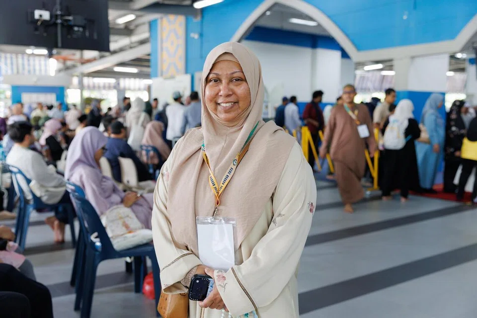 Cik Rohana Md Nor, 48 tahun, terharu menikmati syiar korban secara bersemuka di Masjid Al-Istighfar pada 27 Mei