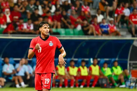 Penyerang Singa, Ilhan Fandi, meraikan jaringan gol tunggal Singa pada minit ke-76 yang berjaya merapatkan jurang kedudukan selepas dimasukkan sebagai pemain gantian.