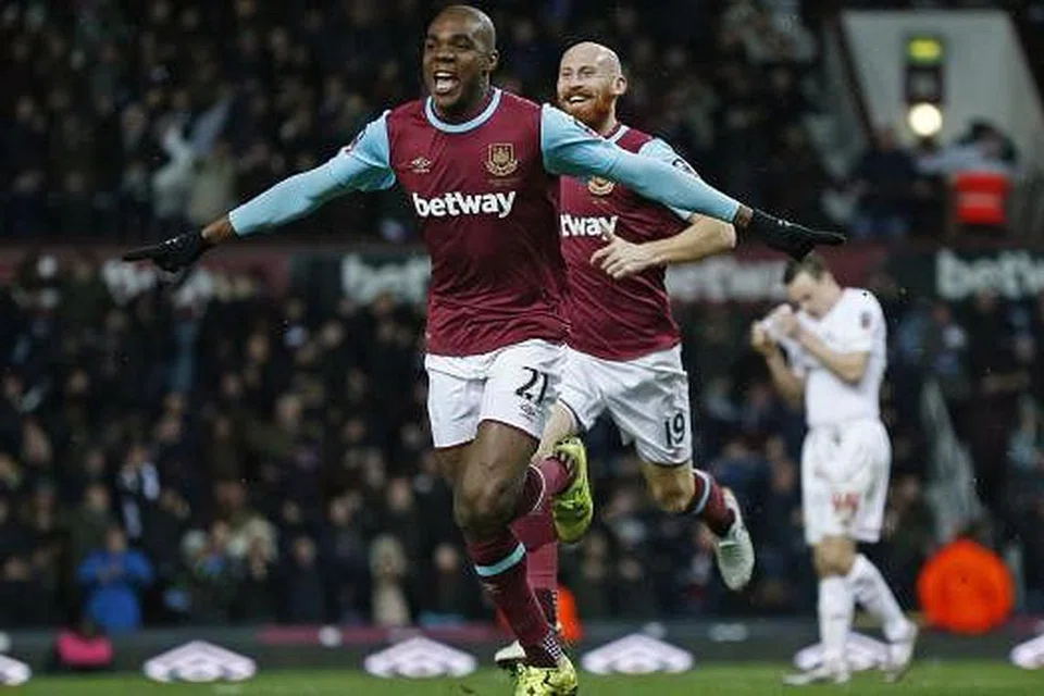 TANDUKAN TAJAM: Ogbonna menanduk masuk gol kemenangan dalam masa kecederaan. - Foto REUTERS