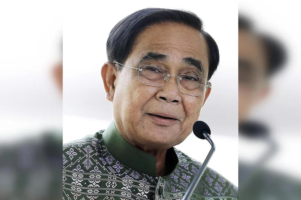 JAWATAN PM JADI REBUTAN: Encik Pita Limjaroenrat mahu dirinya dilantik sebagai perdana menteri Thailand, menggantikan perdana menteri sementara, Encik Prayut Chan-o-cha (gambar atas). - Foto-foto AFP, EPA-EFE