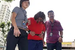 TUKAR PEGUAM: Gaiyathiri Murugayan (atas) mengaku mendera Piang Ngaih Don. - Foto-foto WANBAO, HELPING HANDS FOR MIGRANT WORKERS