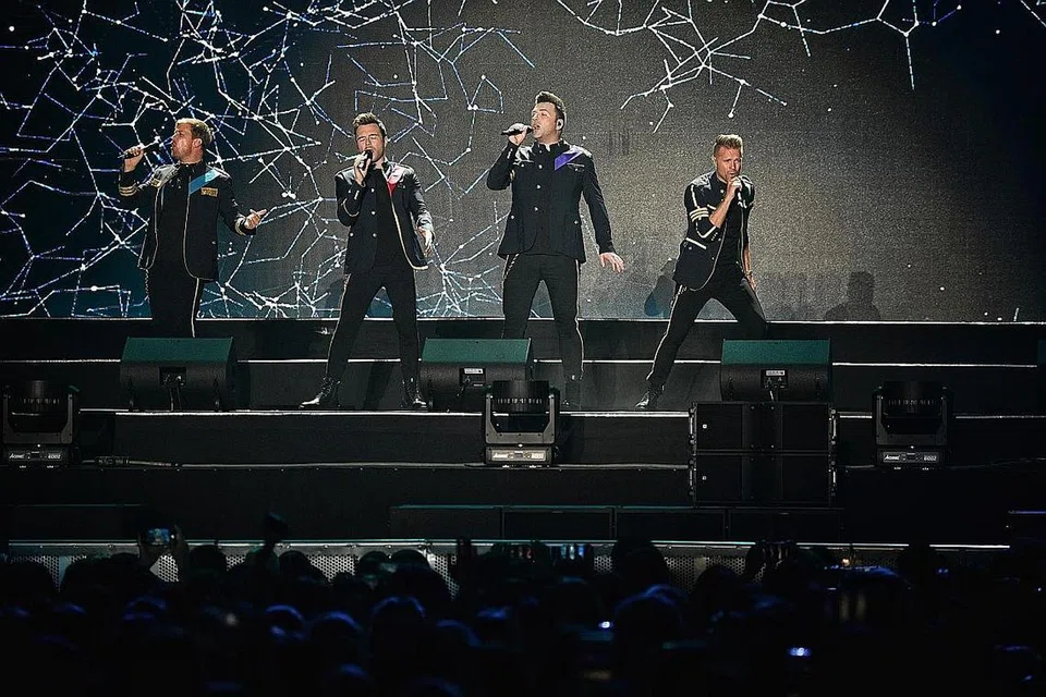 MASIH MENYENGAT: Kumpulan lelaki dari Ireland, Westlife, dijangka membuat persembahan mereka pada 1 Oktober. - Foto fail