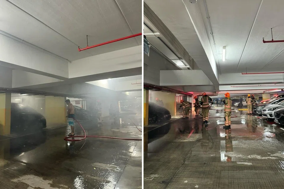 Encik Fahil Ashraff, 35 tahun (gambar kiri) cuba memadamkan api pada sebuah kereta di tempat letak kereta di Blok 467B, Admiralty Drive sebelum pegawai bomba tiba di tempat kejadian.