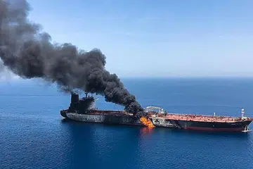 SERANGAN MISTERI: Gambar daripada Agensi Berita Iran ISNA pada 13 Jun yang dilaporkan menunjukkan kebakaran pada kapal tangki Front Altair milik Norway yang dikatakan diserang di perairan Teluk Oman. Teheran menafikan tuduhan Amerika bahawa ia bertanggungjawab bagi serangan tersebut. - Foto AFP.