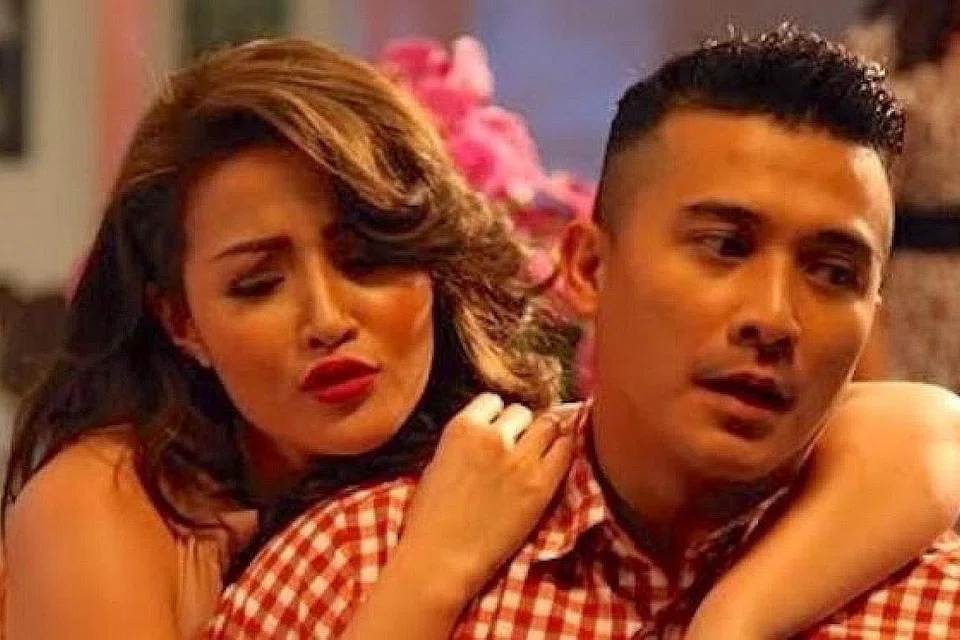 WATAK PENGGODA: Soo Wincci berlakon sebagai Isabella, yang perlu menggoda kekasihnya Taufik lakonan Aaron Aziz dalam filem 'Kau Yang Satu'. - Foto GLOBAL STATION