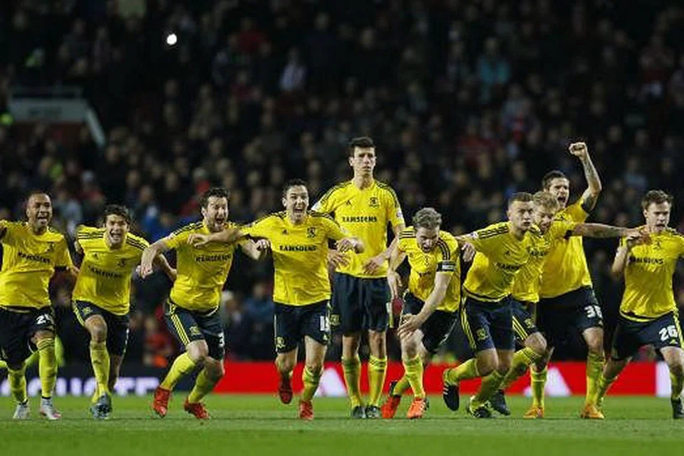  Pemain Middlesbrough menyambut kemenangan 3-1 melalui tendangan penalti ke atas Manchester United setelah perlawanan Piala Liga mereka berakhir dengan seri tanpa gol pada 29 Oktober. Gambar REUTERS 