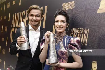 PELAKON DRAMA 'NUR': Pelakon Lelaki Terbaik Drama Rantaian, Syafiq Kyle dan Pelakon Wanita Terbaik Drama Rantaian, Amyra Rosli. 
