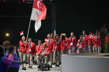 Kontinjen Singapura, yang dibentuk 28 atlet dan kakitangan, di acara pembukaan Sukan Komanwel ke-23 di OVO Arena, yang terletak di Glasgow, Scotland pada 24 Julai (waktu Singapura).