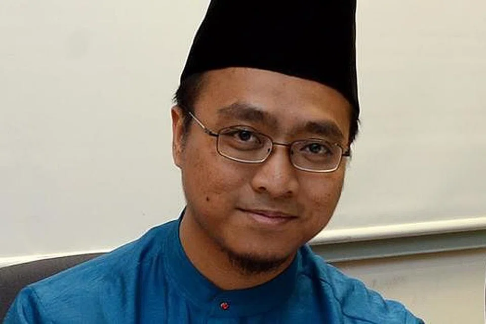 USTAZ TARMIZI WAHID