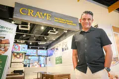 KEJAYAAN LUAR BIASA: Pengasas bersama Crave Nasi Lemak, Encik Abdul Malik Hassan, yang membuka cawangan pertama Crave di pusat beli-belah Hougang Mall (dalam gambar) pada 2015, kini berjaya mengembangkan perniagaan yang bermula dari gerai nasi lemak bapanya di Adam Road sehingga ia mempunyai 43 kedai serata negara hari ini.