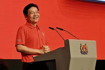 Perdana Menteri, Encik Lawrence Wong, menyampaikan ucaptama di Rapat Hari Pekerja Kongres Kesatuan Sekerja Kebangsaan (NTUC) yang diadakan di D’Marquee di Downtown East pada 1 Mei.