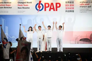 Pasukan Parti Tindakan Rakyat (PAP) GRC Marsiling-Yew Tee yang merangkumi (dari kiri) Cik Hany Soh, Menteri Negara Kanan (Pertahanan merangkap Tenaga Manusia), Encik Zaqy Mohamad; Perdana Menteri, Encik Lawrence Wong; dan Mayor Majlis Pembangunan Masyarakat (CDC) North West, Encik Alex Yam.