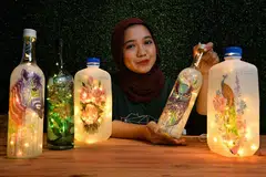 PRODUK KITAR TINGGI: Antara produk kegemaran Cik Nur Nadhirah Azman, yang bertanggungjawab untuk program latihan dan jangkauan Terra SG, adalah lampu botol yang dikitar tinggi secara kreatif, dengan menggunakan bahan botol plastik atau gelas untuk menjadi lampu. - Foto BM oleh CHONG JUN LIANG