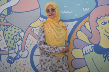 GEMBIRA DIIKTIRAF: Cik Sariah Tomin menyangka tidak berpeluang meraih manfaat seperti Pakej Generasi Perintis sebelum ini, tetapi kini gembira generasinya diiktiraf menerusi Pakej Generasi Merdeka yang juga bertujuan mengurangkan kos penjagaan kesihatan. - Foto BH oleh MARK CHEONG