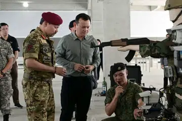 Putera Mahkota Brunei yang juga Menteri Kanan di Pejabat Perdana Menteri, Putera Al-Muhtadee  Billah (kiri), melakukan lawatan rasmi ke Safti City bersama Pemangku Menteri Bertanggungjawab bagi Ehwal Masyarakat Islam merangkap Menteri Negara Kanan (Pertahanan), Encik Zaqy Mohamad (dua dari kiri), pada 30 September.