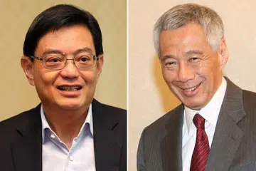 PERDANA Menteri Lee Hsien Loong (kanan) dan Timbalan Perdana Menteri, Encik Heng Swee Keat (kiri).