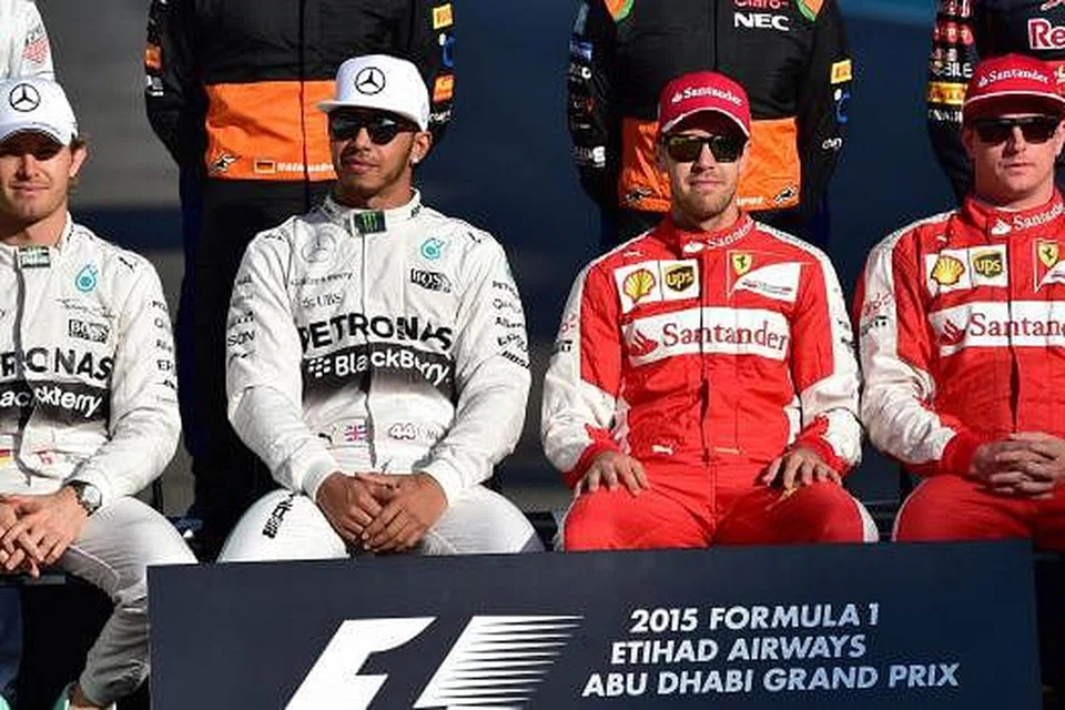PESAING UTAMA: Ferrari, yang diwakili (dari kanan) Kimi Raikkonen dan Sebastian Vettel, dianggap pencabar utama Mercedes, yang diwakili (dari kiri) Nico Rosberg dan Lewis Hamilton. - Foto AFP
