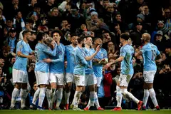 RAIKAN GOL: Pemain Manchester City, Phil Foden (empat dari kanan) meraikan gol bersama rakan-rakan selepas menjarikan gol keenam sewaktu peringkat suku akhir Liga Juara-Juara Eropah. City membelasah wakil Jerman, Schalke 7-0. - Foto EPA-EFE