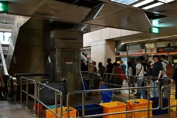 stesen MRT Raffles Place, air bocor dari siling, NSL