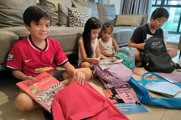 MEMANFAATKAN WANG GSTV: Empat adik-beradik - (dari kiri) Muhammad Lutfi Talish Muhammad Ali, Luna Saara Muhammad Ali, Delisha Ereshva Muhammad Ali dan Muhammad Danish Afi Muhammad Ali - menggunakan wang GSTV bernilai $700 untuk persiapan sekolah tahun depan. - Foto ihsan CIK WAN ALOEIYAH WARKI