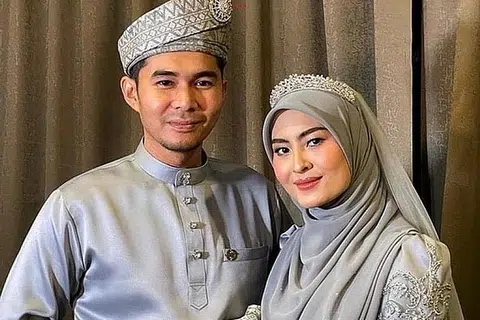 BUDI BAIK MEMIKAT HATI: Juruterbang Mohd Al-Adib Fahmi Harun (kiri), terpaut hati pada penyanyi Wany Hasrita kerana sikapnya yang tidak mudah merungut ketika ditimpa masalah, baik hati dan tidak suka bercakap tentang keburukan orang lain.